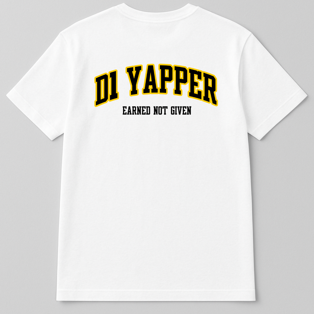 Back view of a white t-shirt with the text 'D1 YAPPER' in large, bold, yellow and black letters and 'EARNED NOT GIVEN' in smaller black letters below it.