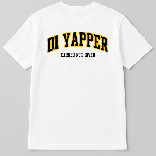 Back view of a white t-shirt with the text 'D1 YAPPER' in large, bold, yellow and black letters and 'EARNED NOT GIVEN' in smaller black letters below it.